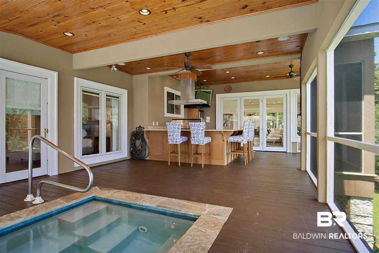 3136 Cumberland Road Theodore, AL 36582 - Photo 24 of 50 From the kitchen to pool in a few short steps.