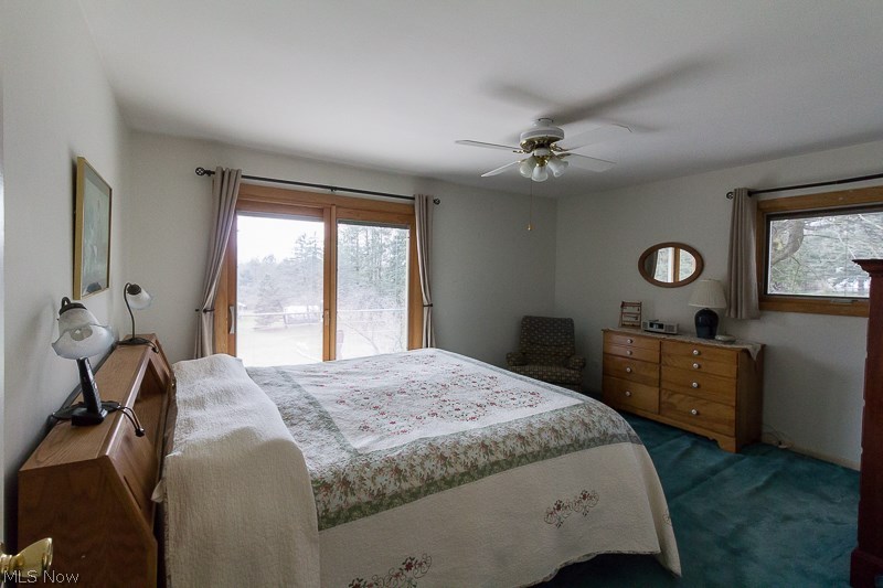 5830 Beach Road Wadsworth, OH 44281 - Photo 22 of 32 Master bedroom with sliders - sunny and bright!