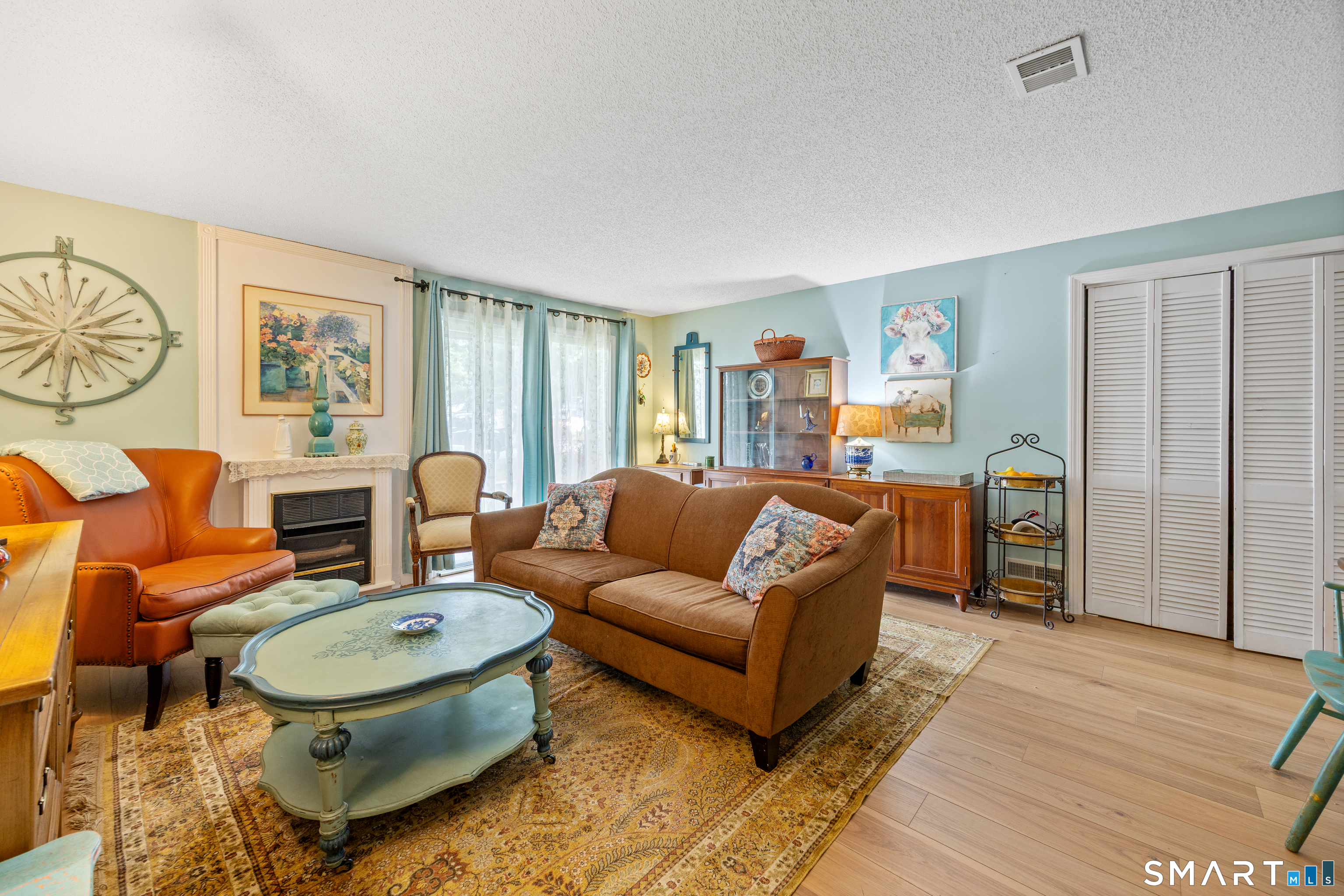 111 Strathmore Lane, Unit 111 Wallingford, CT 06492 - Photo 20 of 32 Large lower level family room with slider to patio