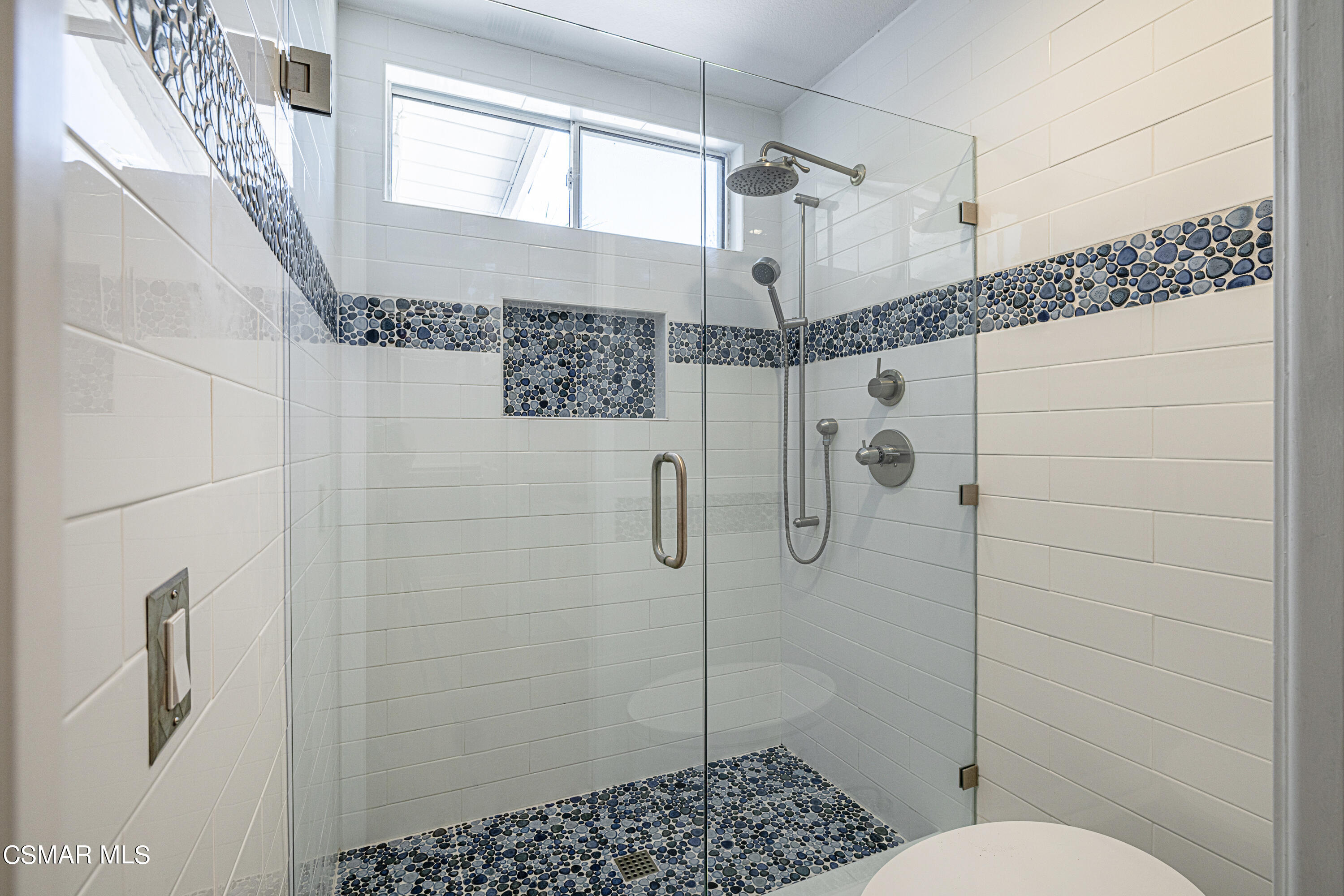 1703 Empty Saddle Road Simi Valley, CA 93063 - Photo 15 of 37 a bathroom with a shower
