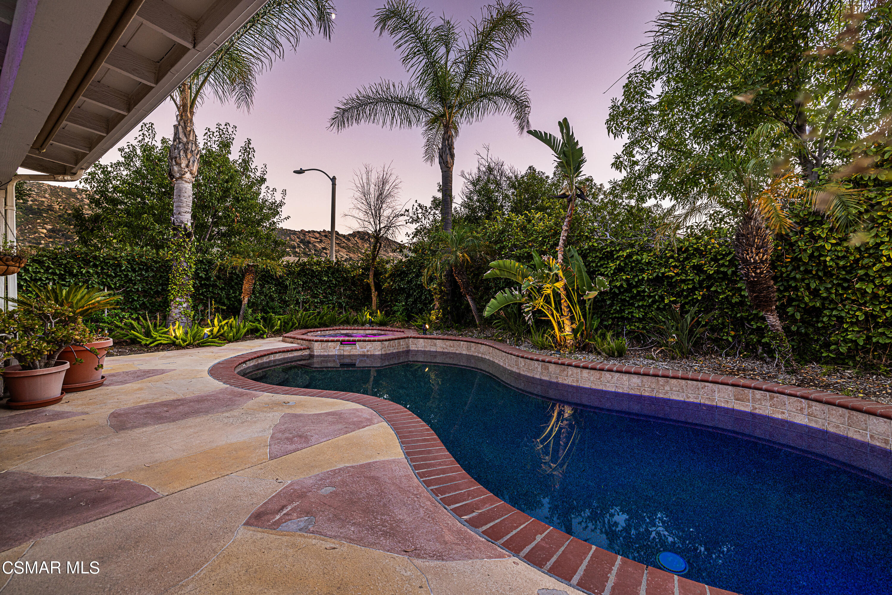 1703 Empty Saddle Road Simi Valley, CA 93063 - Photo 28 of 37 a view of backyard with swimming pool and outdoor seating