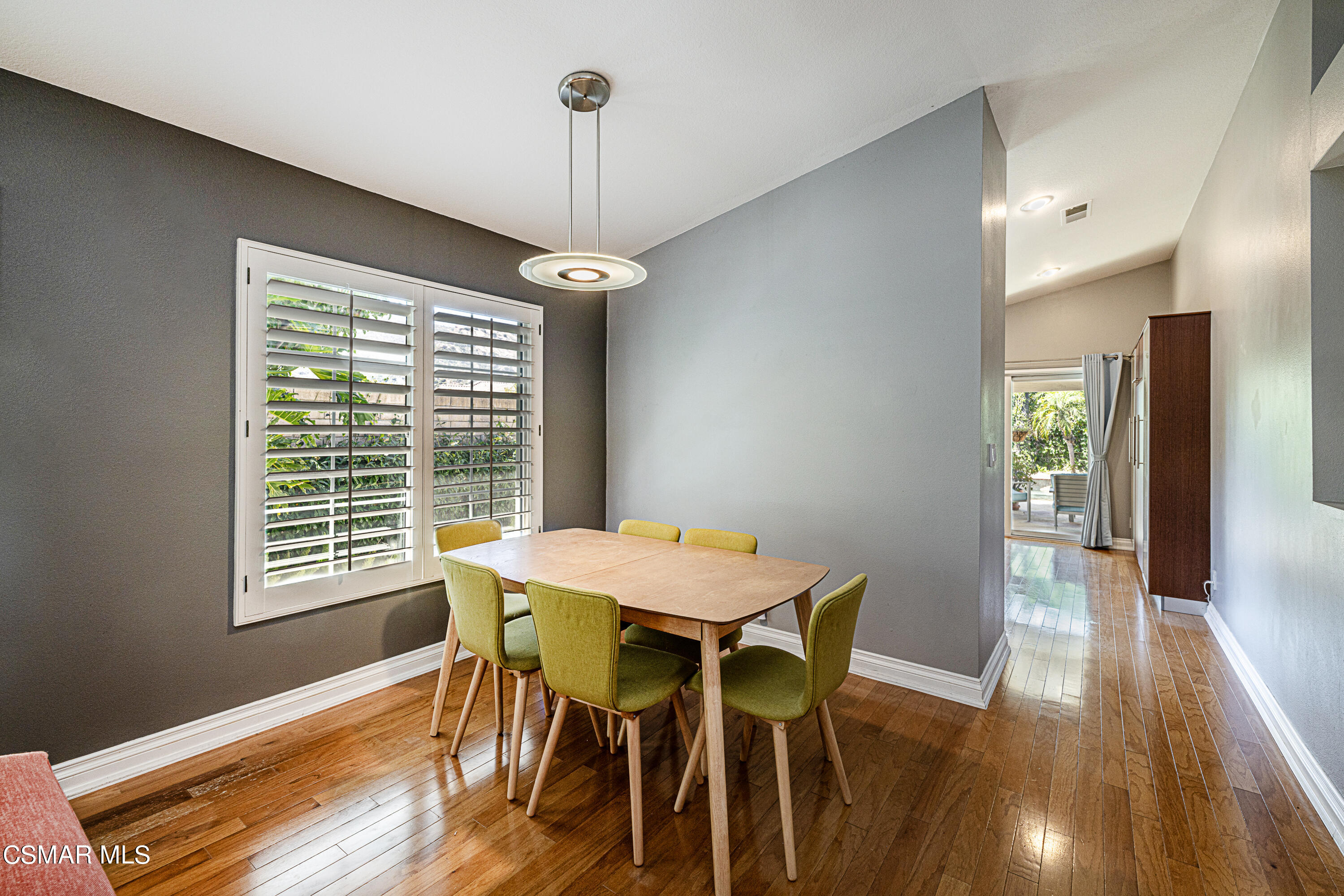 1703 Empty Saddle Road Simi Valley, CA 93063 - Photo 5 of 37 a view of a dining room with furniture window and wooden floor