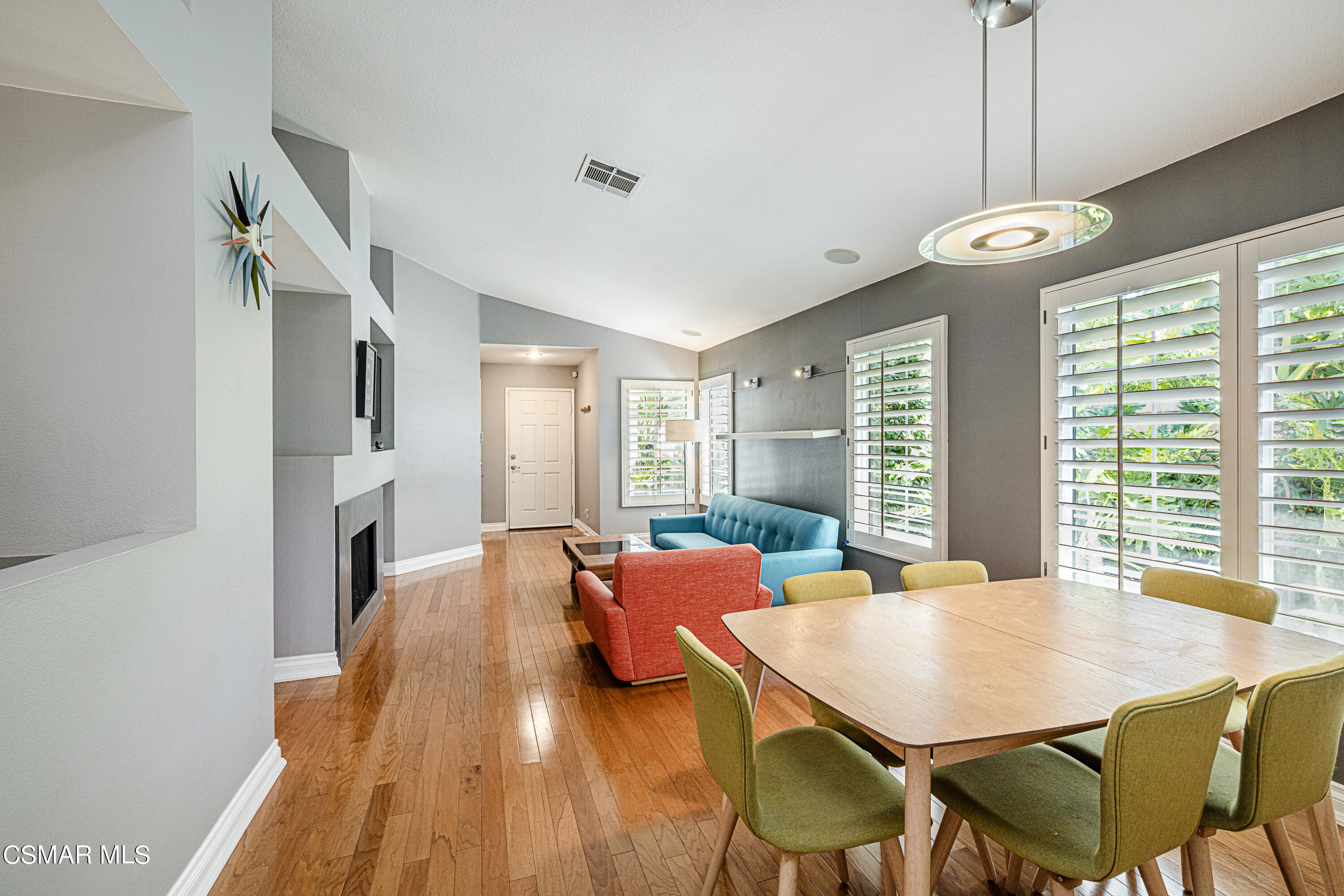 1703 Empty Saddle Road Simi Valley, CA 93063 - Photo 6 of 37 a view of a dining room with furniture window and wooden floor