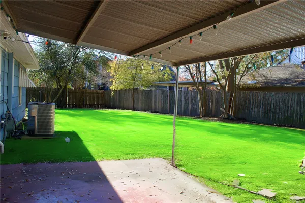 a view of a backyard with a garden