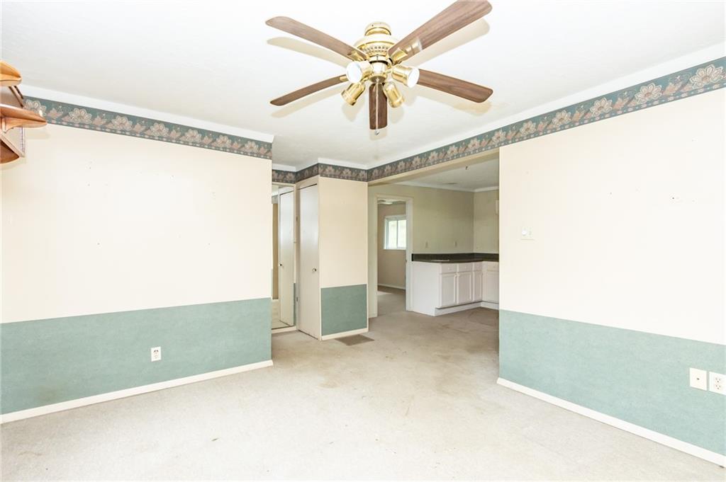 1736 Maple Road New Bethlehem, PA 16242 - Photo 12 of 22 a view of a room with cabinet and a ceiling fan