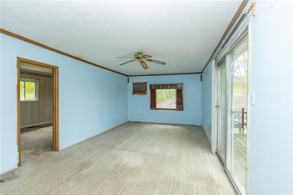 1736 Maple Road New Bethlehem, PA 16242 - Photo 20 of 22 an empty room with window and ceiling fan