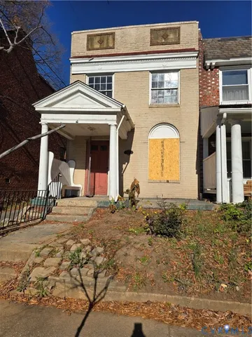 a view of a house with two windows