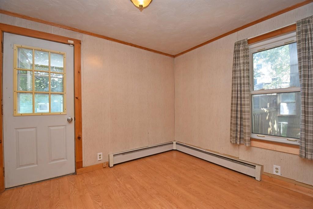 9 Catacunemaug Road Shirley, MA 01464 - Photo 2 of 22 an empty room with windows