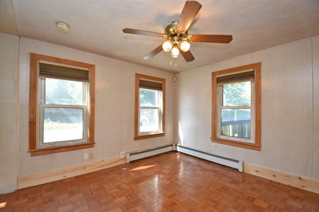 9 Catacunemaug Road Shirley, MA 01464 - Photo 7 of 22 a view of an empty room with a window and closet