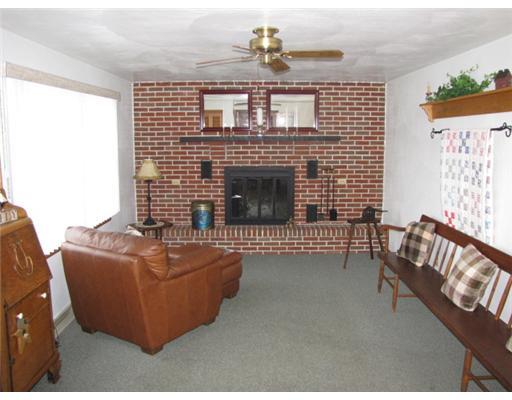 84 Smail Road Leechburg, PA 15656 - Photo 9 of 17 Family Room. Relax in the cozy 1st floor family room around the floor to ceiling brick fireplace