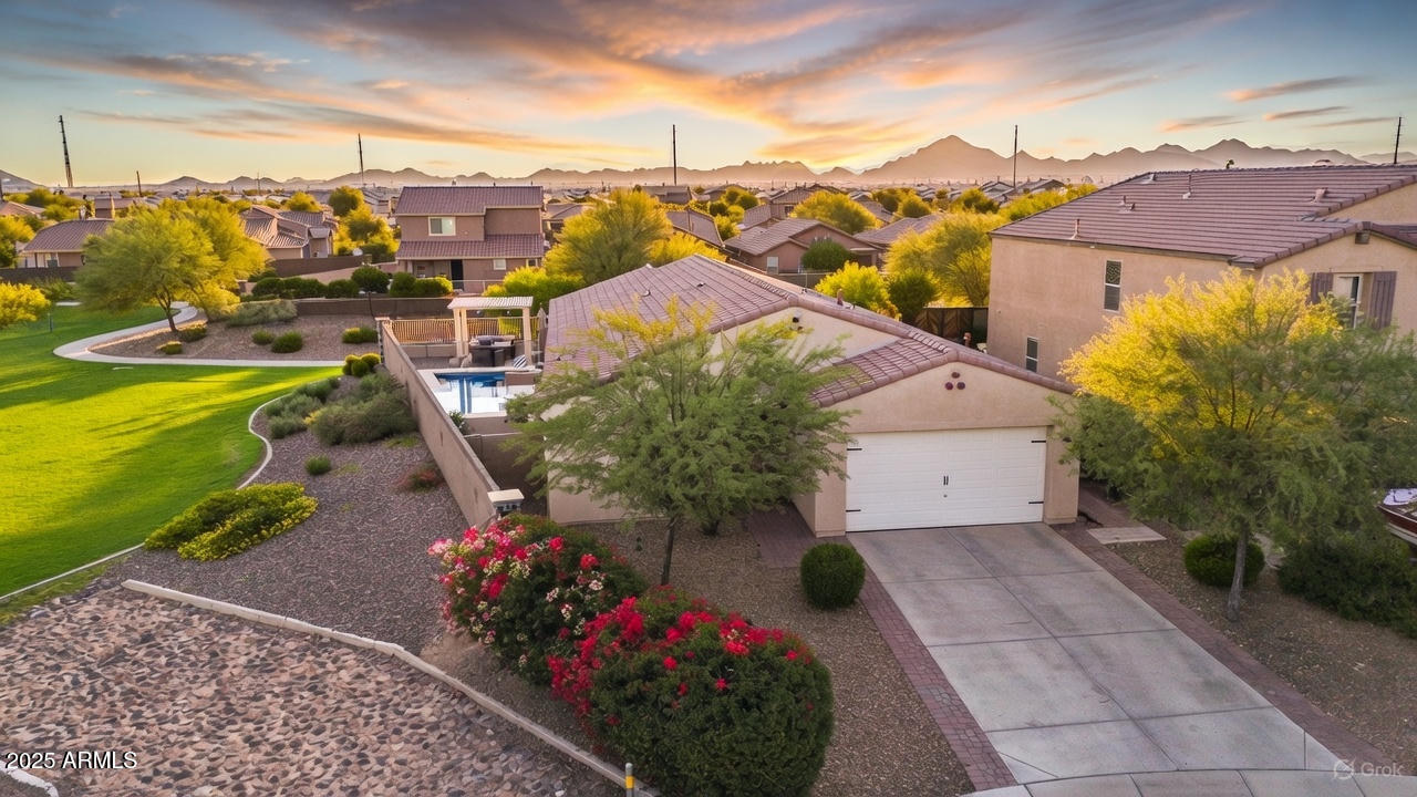 a view of a house with a yard