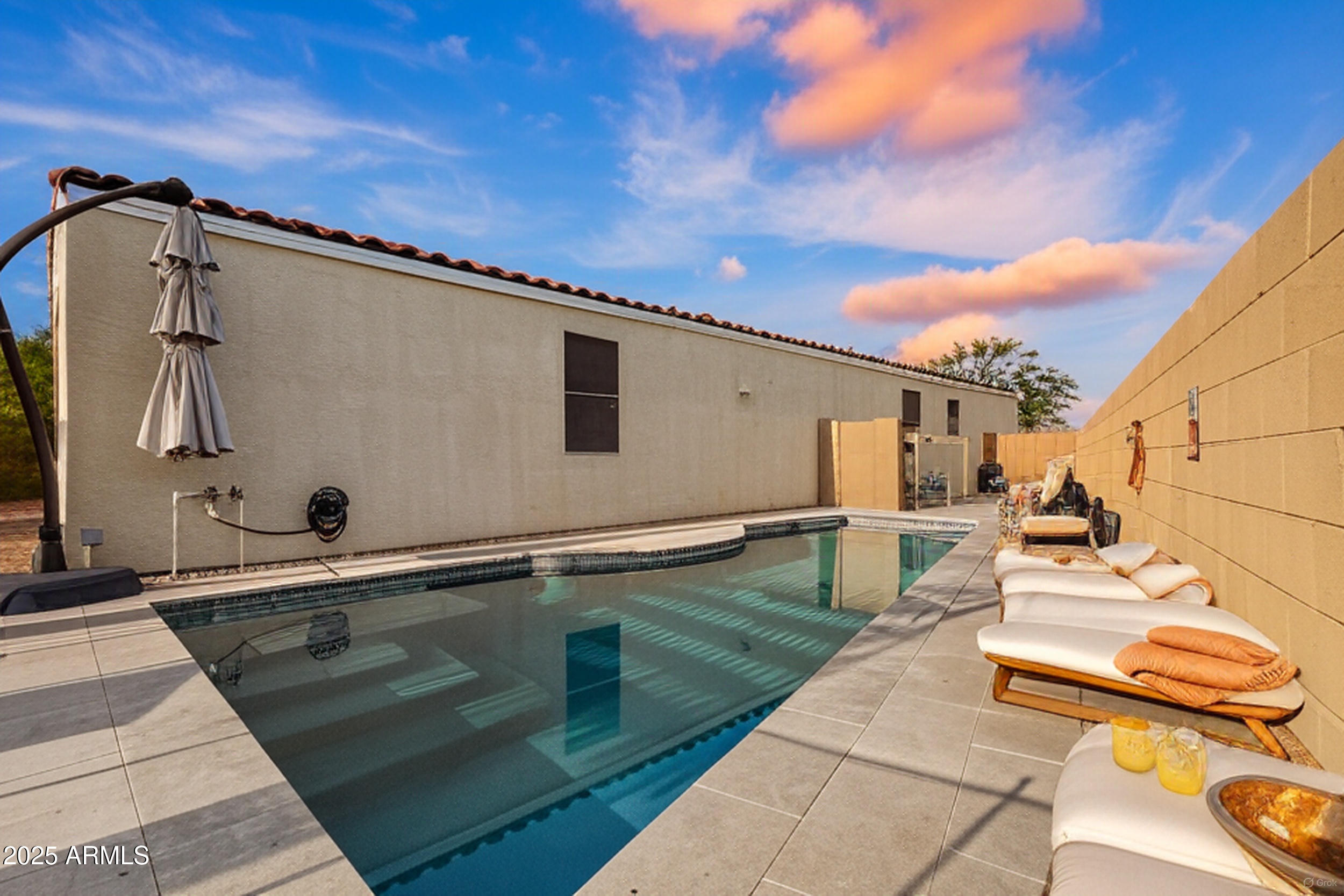 37104 Big Bend Road San Tan Valley, AZ 85140 - Photo 4 of 25 a view of a terrace with chairs
