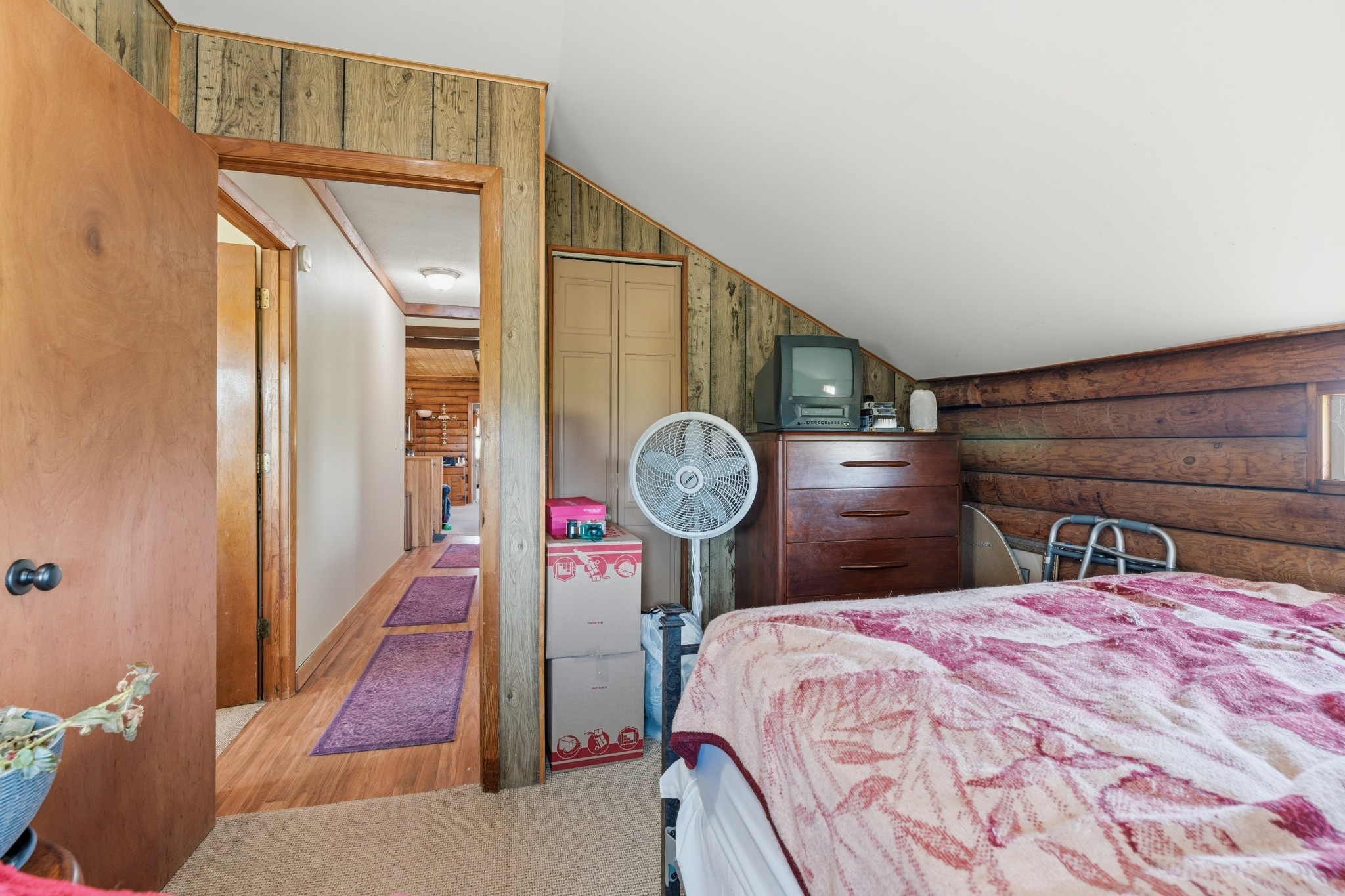 6660 Highland Road Portland, TN 37148 - Photo 22 of 34 a bedroom with a bed a mirror and a shower