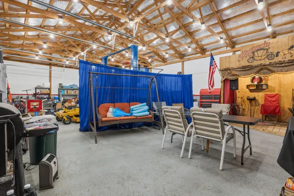 a bedroom with a bed and a table in it
