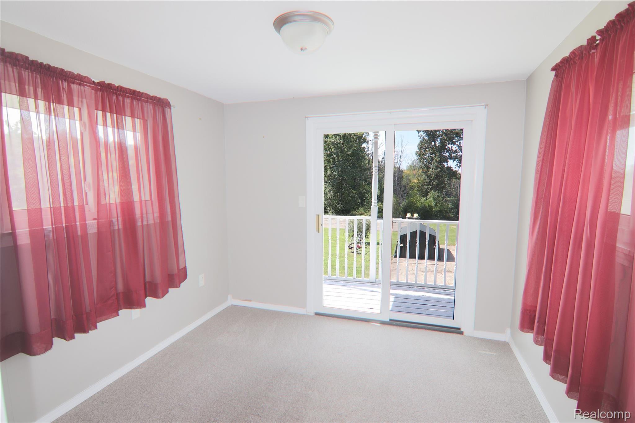 11156 Fenton Road Fenton, MI 48430 - Photo 15 of 22 11156 Fenton Rd - Sitting Room.jpg