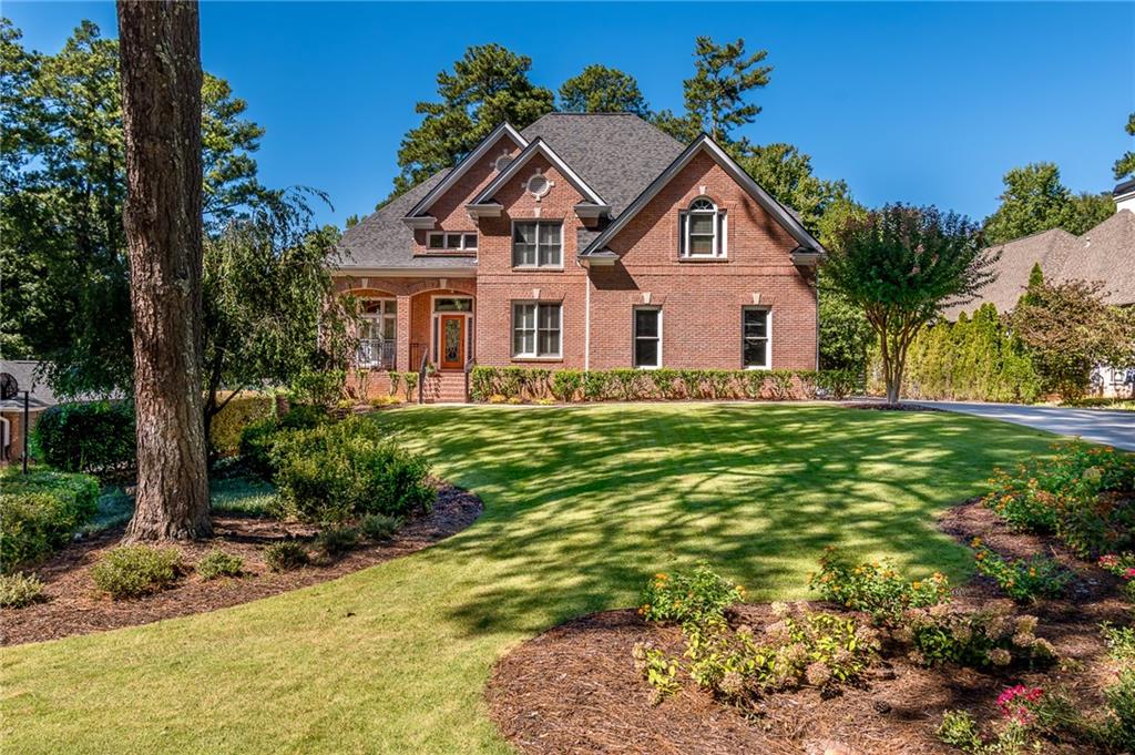 2454 Fairoaks Road Decatur, GA 30033 - Photo 1 of 1 a front view of a house with a garden