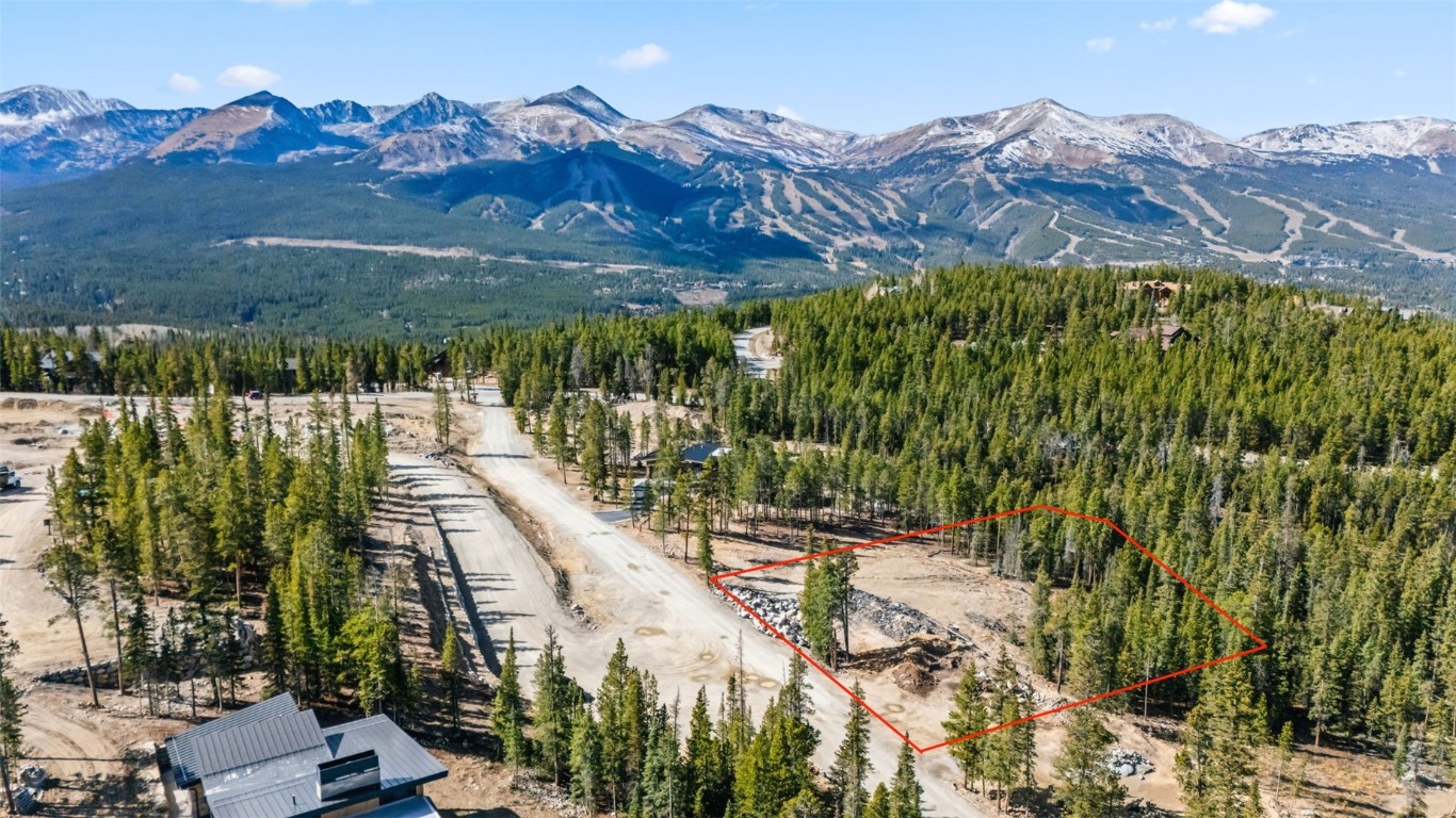 115 Sallie Barber Road Breckenridge, CO 80424 - Photo 8 of 15 a view of a swimming pool with a yard and mountain view