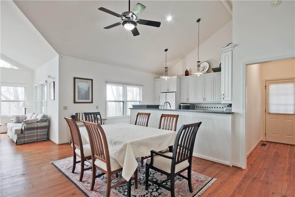 193 Valley View Trail Jasper, GA 30143 - Photo 14 of 61 a view of a dining room with furniture and wooden floor