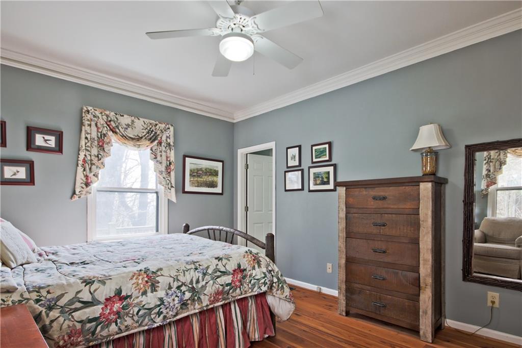 193 Valley View Trail Jasper, GA 30143 - Photo 24 of 61 a bedroom with a bed and a dresser