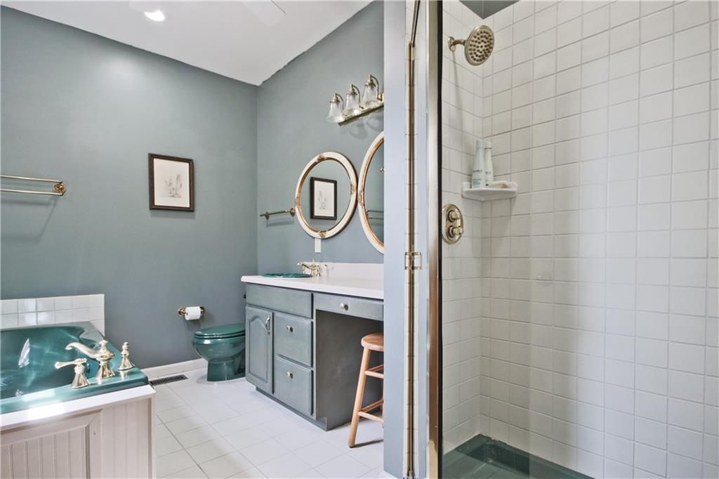 193 Valley View Trail Jasper, GA 30143 - Photo 25 of 61 a bathroom with a toilet sink and shower