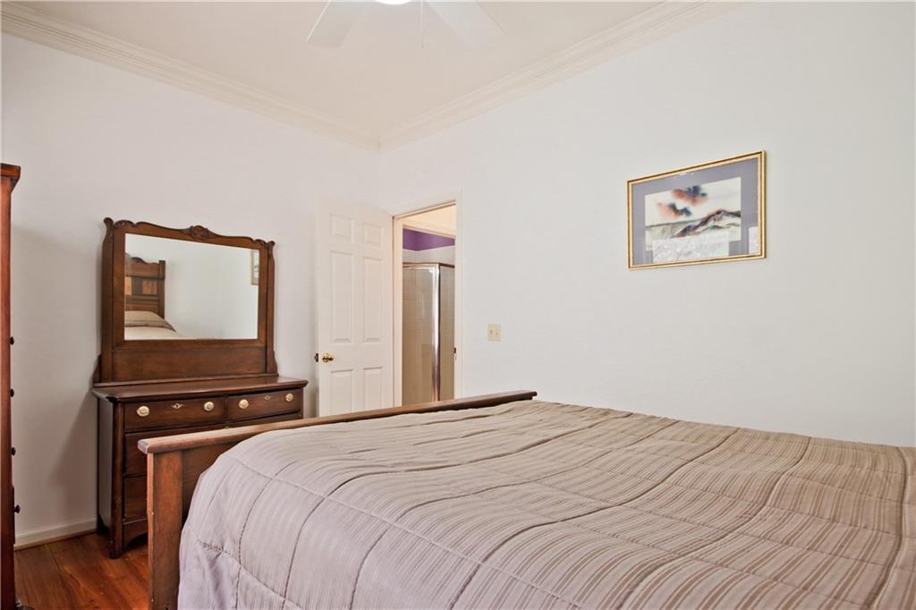 193 Valley View Trail Jasper, GA 30143 - Photo 30 of 61 a bedroom with a bed and a painting on the wall