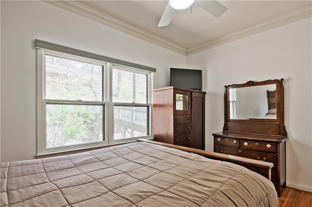 193 Valley View Trail Jasper, GA 30143 - Photo 31 of 61 a bedroom with a bed dresser and a window