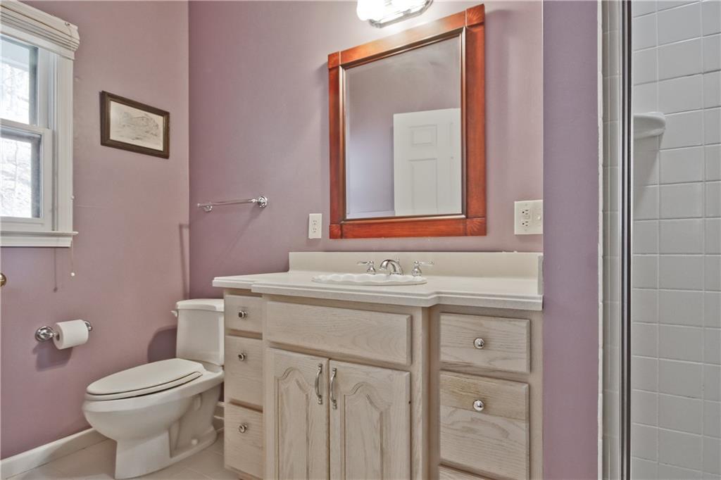 193 Valley View Trail Jasper, GA 30143 - Photo 32 of 61 a bathroom with a sink a toilet and mirror