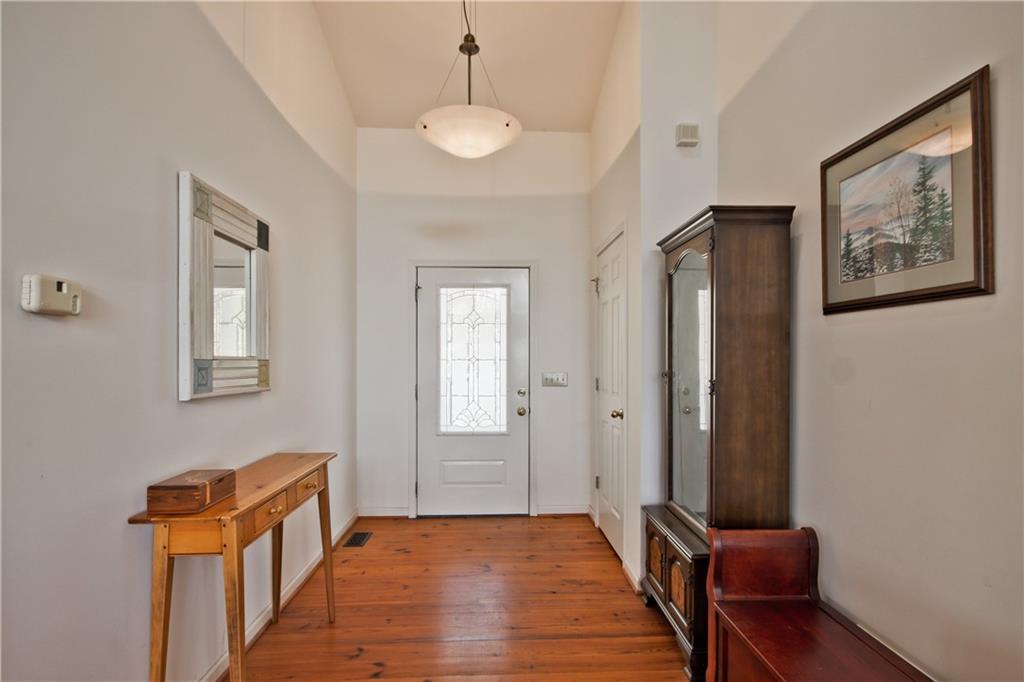 193 Valley View Trail Jasper, GA 30143 - Photo 5 of 61 a view of a hallway with wooden floor and chair