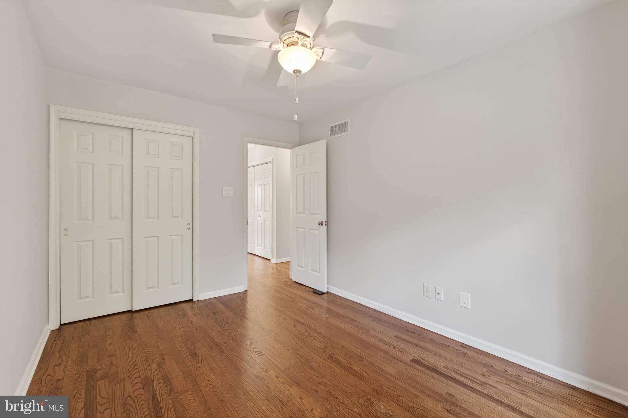 1202 Harbour Ridge Lane Downingtown, PA 19335 - Photo 18 of 37 a view of an empty room with wooden floor