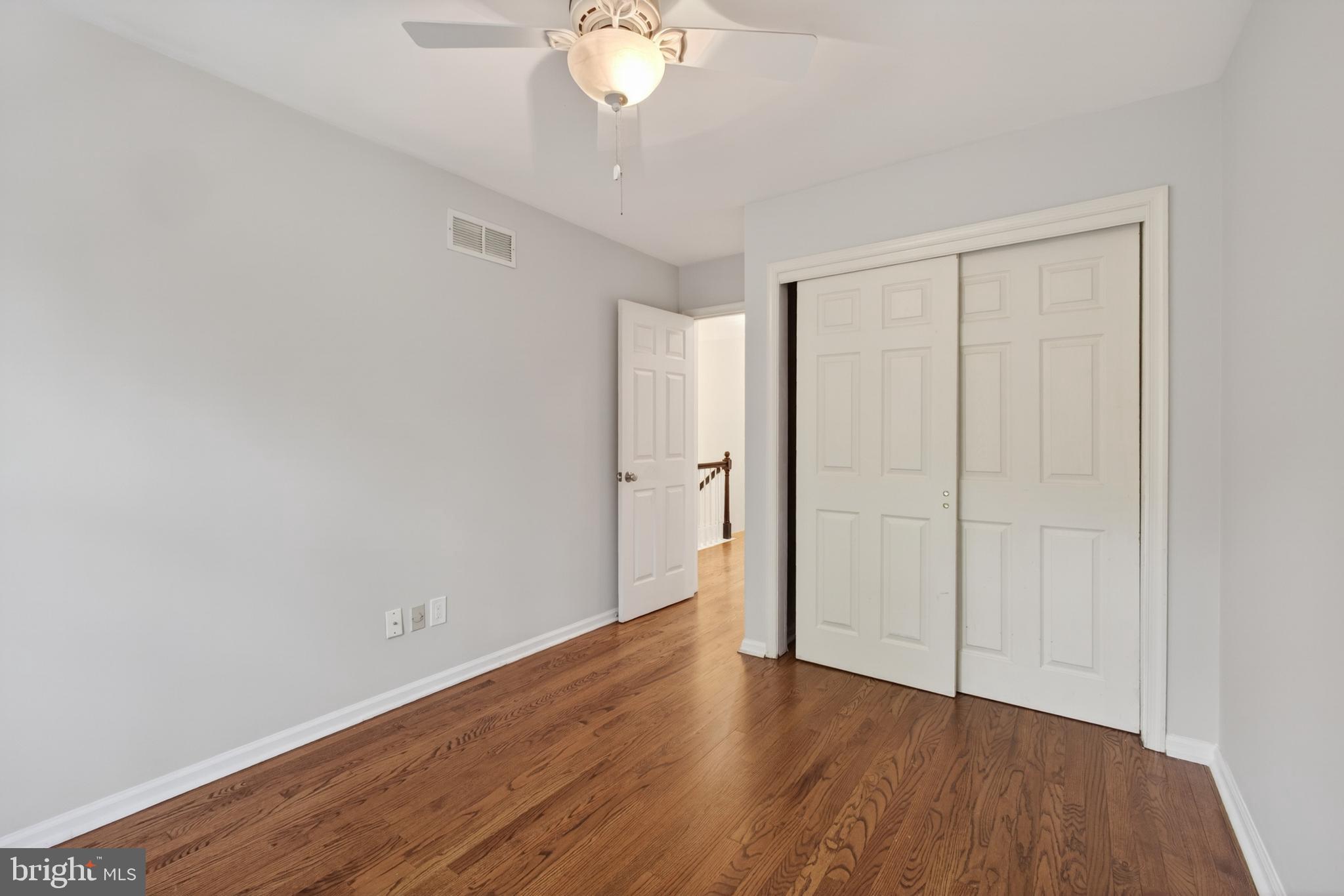 1202 Harbour Ridge Lane Downingtown, PA 19335 - Photo 22 of 37 a view of an empty room with wooden floor