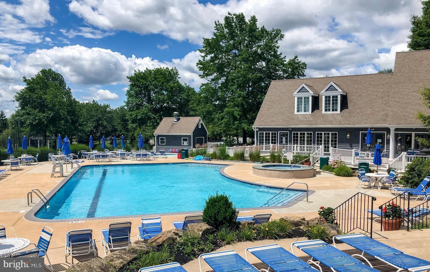 1202 Harbour Ridge Lane Downingtown, PA 19335 - Photo 32 of 37 a swimming pool with outdoor seating and yard