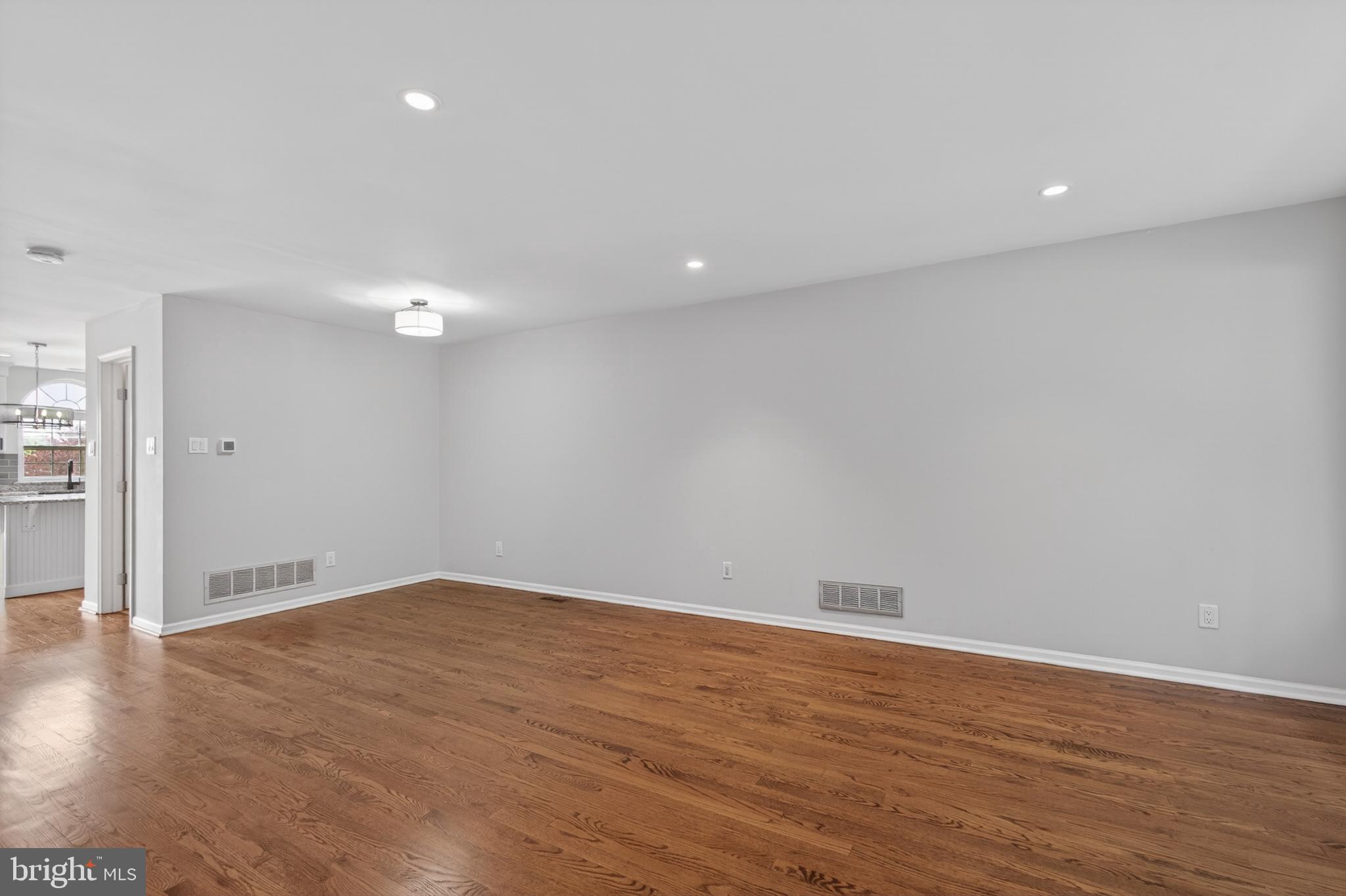 1202 Harbour Ridge Lane Downingtown, PA 19335 - Photo 5 of 37 a view of room with wooden floor and white walls