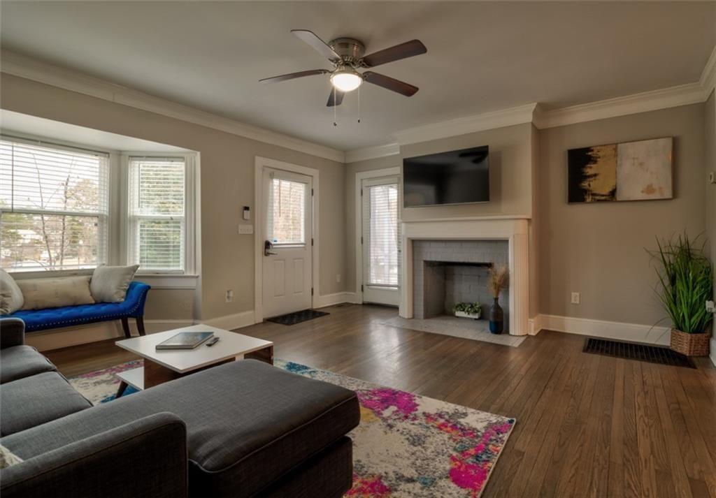 1074 Jefferson Avenue East Point, GA 30344 - Photo 1 of 13 a living room with furniture and a fireplace
