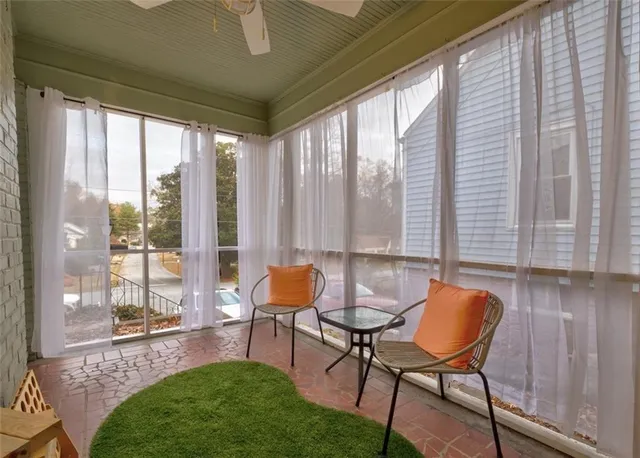 a outdoor living space with furniture and a garden