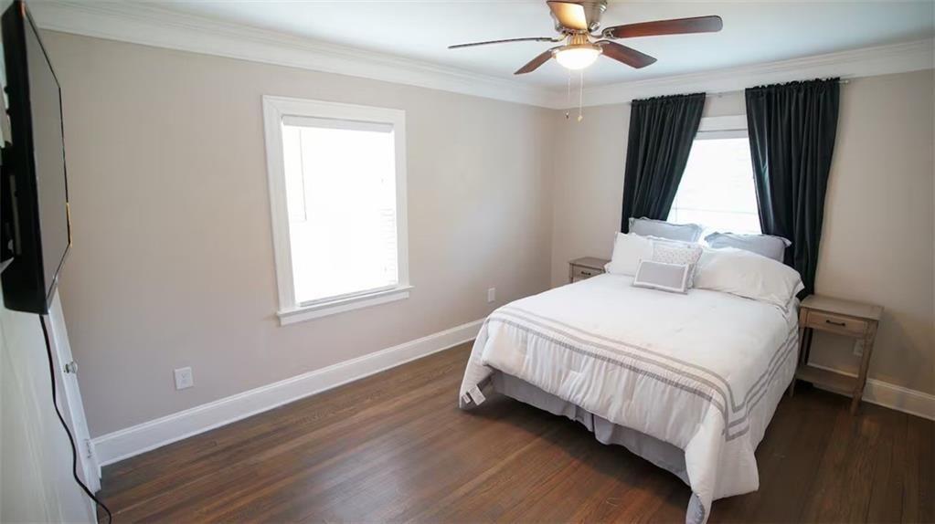 1074 Jefferson Avenue East Point, GA 30344 - Photo 5 of 13 a bedroom with a bed and window