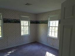 2 Donna Road West Wareham, MA 02576 - Photo 6 of 8 an empty room with windows