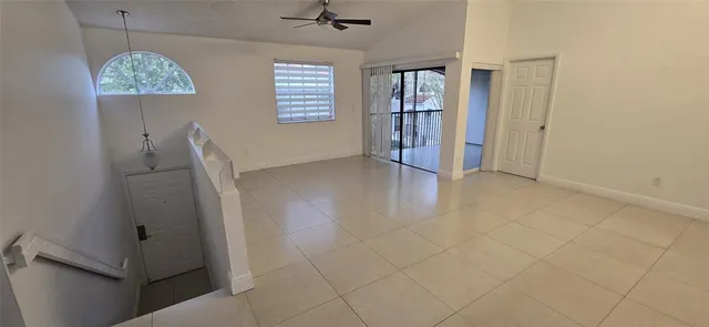 a bathroom with a sink a mirror and shower