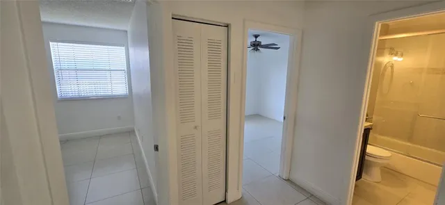 a kitchen with stainless steel appliances a refrigerator stove microwave and sink