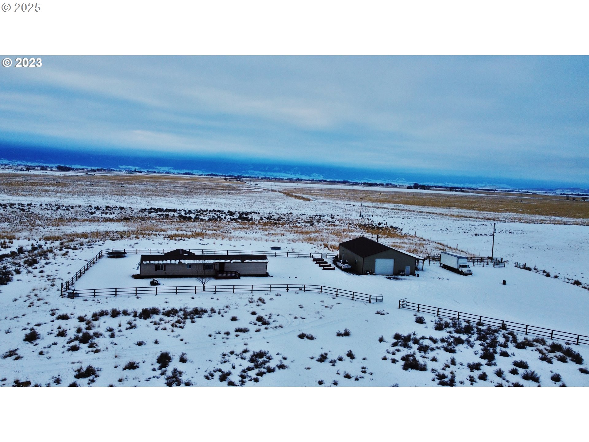 a bathroom with a sink and a view of living room