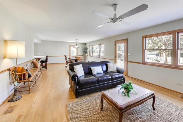 a living room with furniture and a table