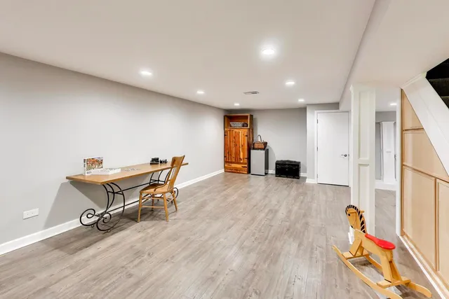 a room with furniture and a wooden floor