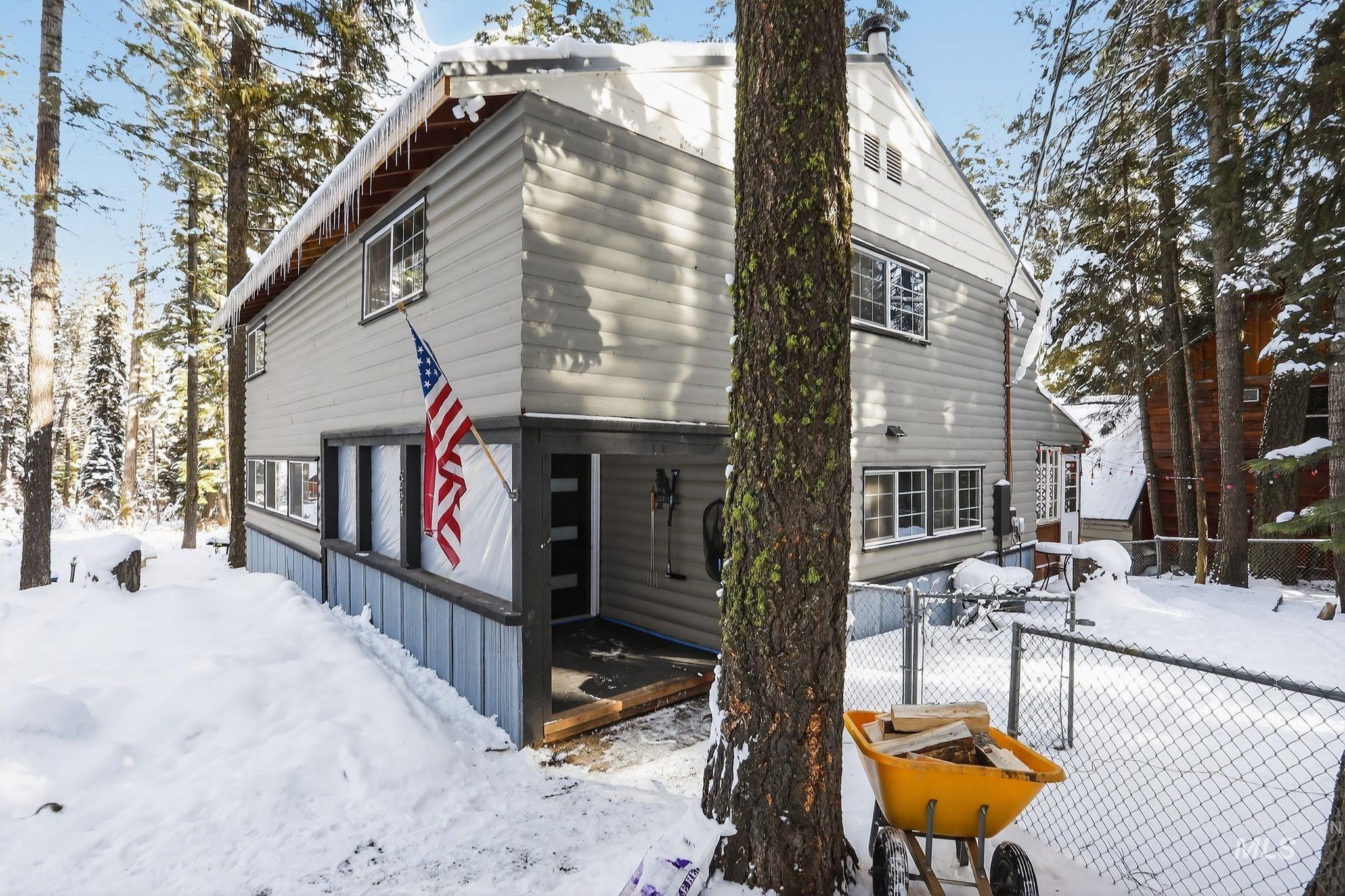 654 Bings Road Cascade, ID 83611 - Photo 1 of 40 Snow covered property with a chimney