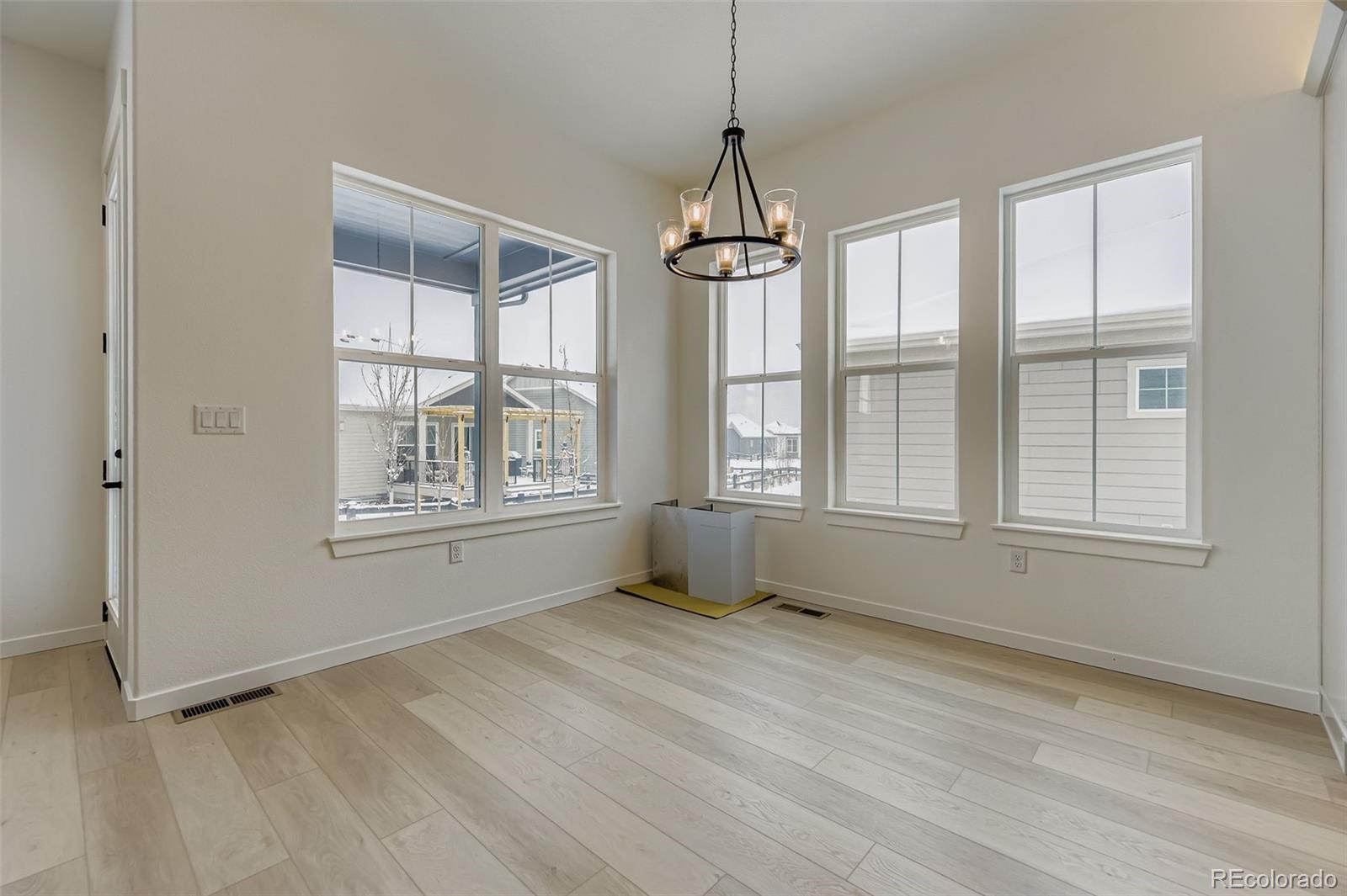 8895 South Riviera Way Aurora, CO 80016 - Photo 13 of 26 a view of an empty room with a window
