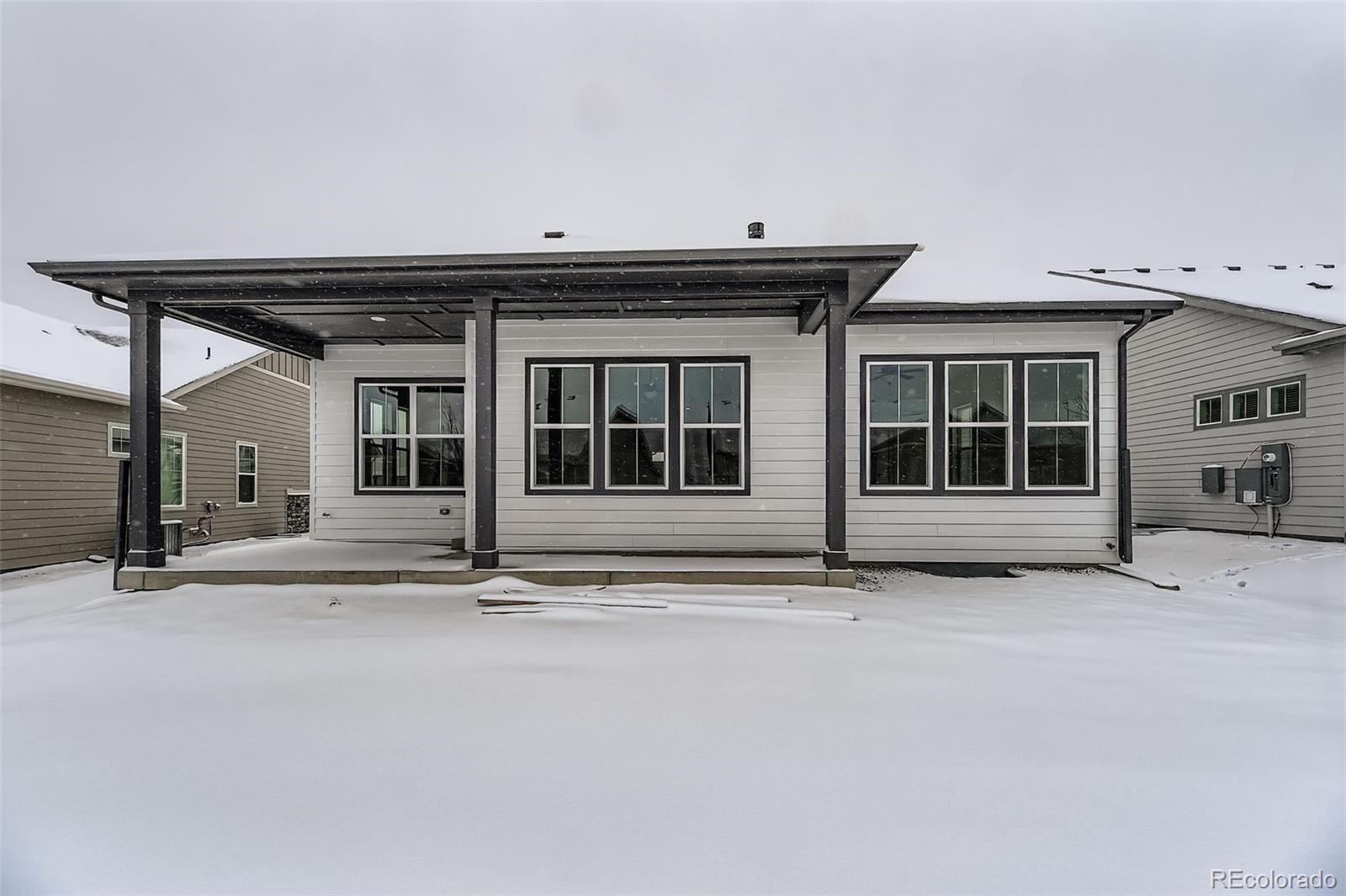 8895 South Riviera Way Aurora, CO 80016 - Photo 25 of 26 a view of house with front door