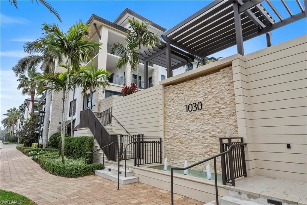 1030 3rd Avenue South, Unit 315 Naples, FL 34102 - Photo 4 of 29 a view of a house with a patio