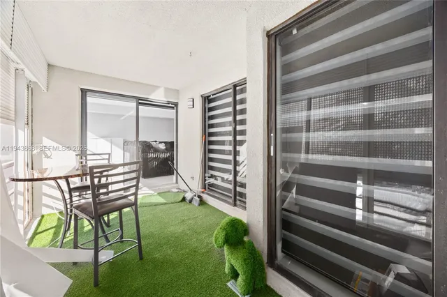 a view of entryway with stairs and wooden floor