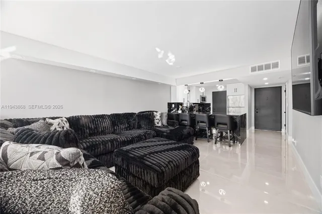 a living room with furniture and a couch