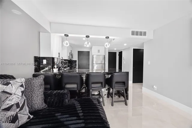 a view of a dining room with furniture