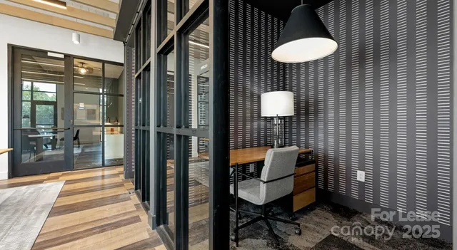 a balcony with chairs and table