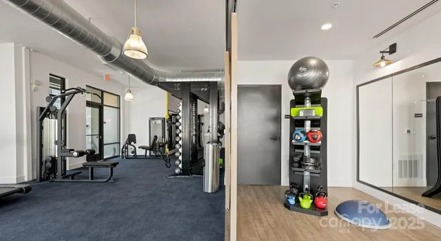 a view of game room with gym equipment